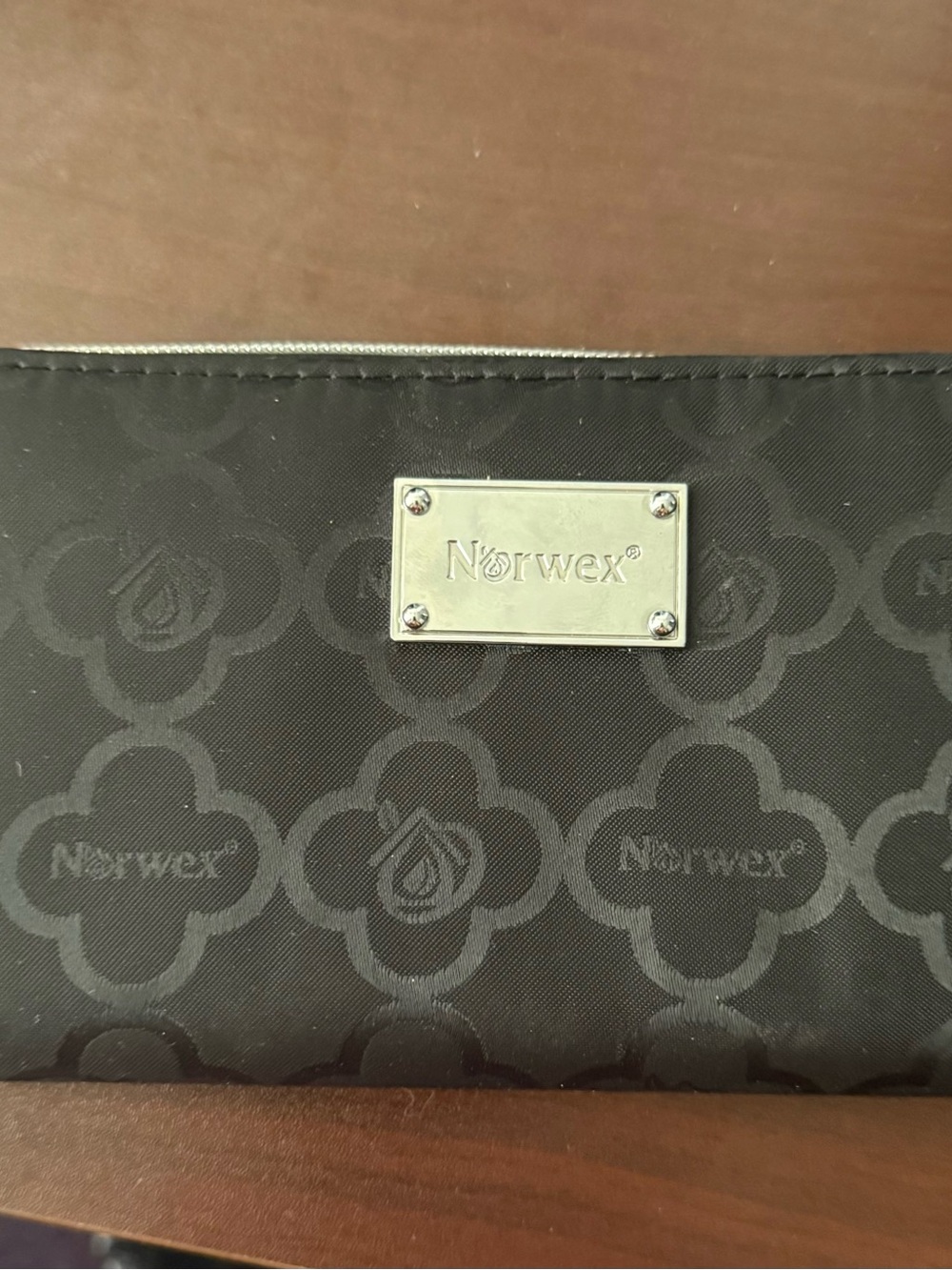 Norwex Black Quilted Logo Zip Wallet with Silver Plate